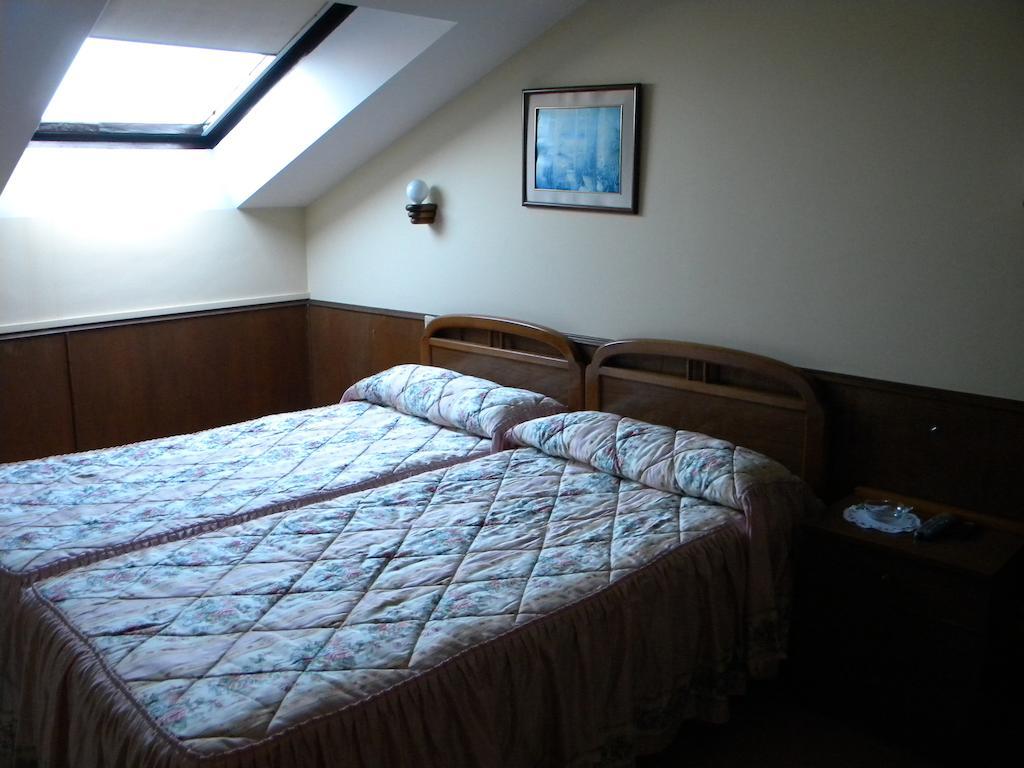 Hotel Solymar Bricia Quarto foto